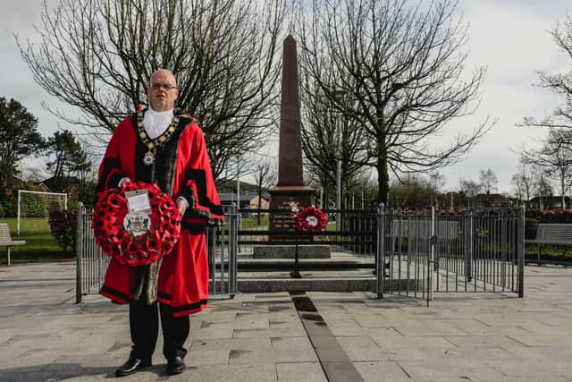 Cllr Jim Montgomery at Glengormley War Memorial following last month's attack.