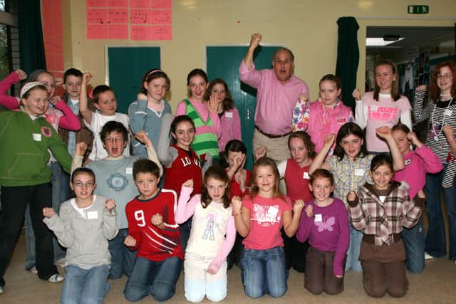 Ten to fourteen-year-olds who took part in a drama workshop at St Joseph's Primary School Ahoghill on Saturday are seen here with drama tutor John Williams. The event was organised by the Victoria College of Music & Drama. BT46-135JC