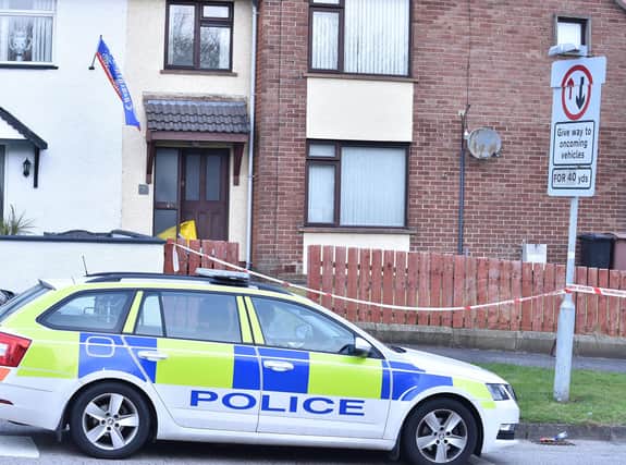 Police at the scene in Derrycoole Way on Saturday morning.

A murder investigation has been launched after three people were found dead at separate properties in Newtownabbey.
Pic: Colm Lenaghan/Pacemaker