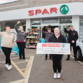 (Back row) Customer Advisors at SPAR Viking Lodge, Hannah Glass and Aaron Baxter with Post Office Manager, Adam McIlroy.  (Front row) SPAR Viking Lodge Customer Advisors Fiona McMurran and Nikole McIntyre with Founder of Hope House, Dawn McConnell.