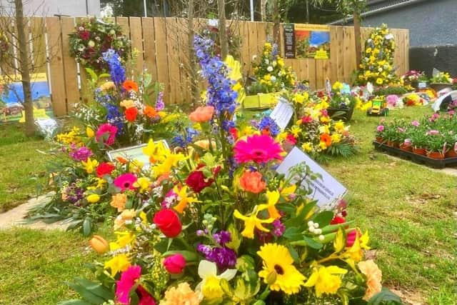 Volunteers from Broughshane and District Community Association decided to organise a floral tribute in the village for  Marie Curie's 'Day of Reflection'