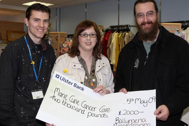 David McGookin (right) of Ballymena Rider Training presents a cheque for £2000 (proceeds of the Easter Egg Run) to Heather Miller who is Community Fund Raising Co-ordinator with Marie Curie Cancer Care and Roger Moore who is assistant manager of the Marie Curie Charity Shop, Wellington Street. BT19-104JC