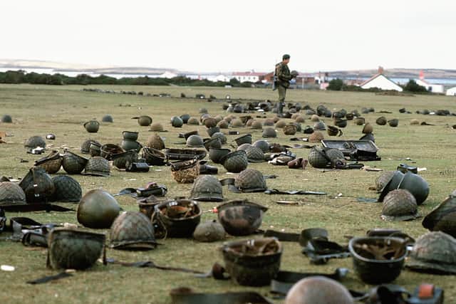 Steel helmets abandoned by Argentine armed forces who surrendered at Goose Green to British Falklands Task Force troops in May 1982. Picture: PA Wire