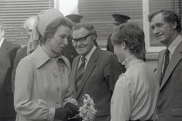 Heather Murdoch presents a posy to Princess Anne during her visit to Hillsborough in March 1982. Picture: Bob Hamilton/News Letter archives