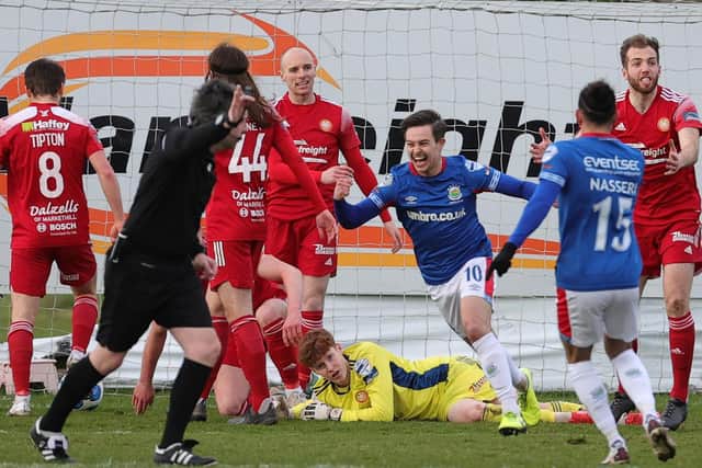 Jordan Stewart celebrates breaking the deadlock at Shamrock Park for Linfield against Portadown. Pic by Pacemaker.