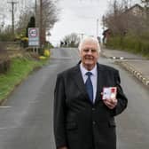 Cookstown 100 race secretary Norman Crooks with his British Empire Medal on the Cookstown 100 course in Co Tyrone. Picture: Baylon McCaughey.