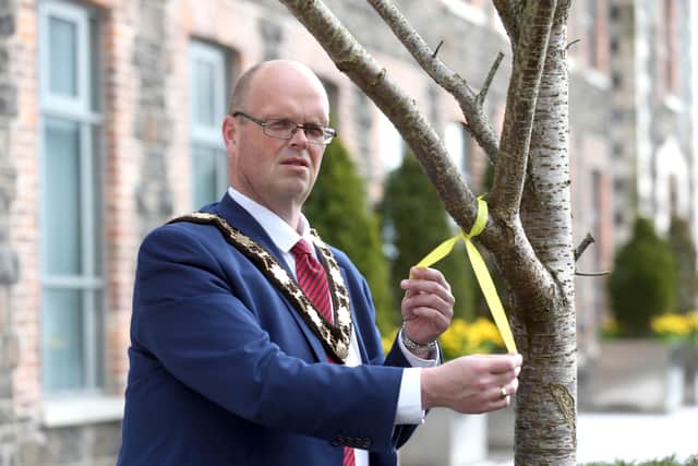 Mayor Cllr Jim Montgomery led the borough in marking the  National Day of Reflection last month.