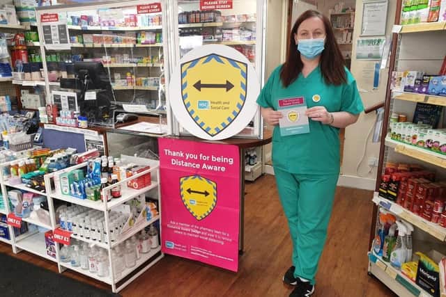 Martina O’Kane from Harkin Pharmacy Maghera promotes the ‘Distance Aware’ social distancing campaign, which is currently running across 500 Community Pharmacies in Northern Ireland
