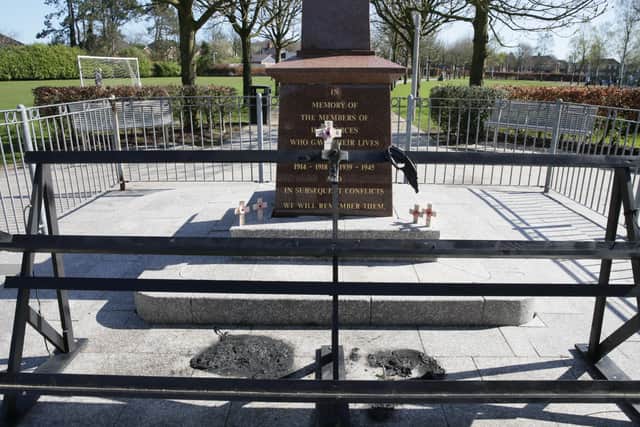 Poppy wreathes arranged on a special stand were burned and scorch damage caused at Glengormley war memorial. Police are treating the attack as a hate crime. Photo Stephen Davison/Pacemaker Press