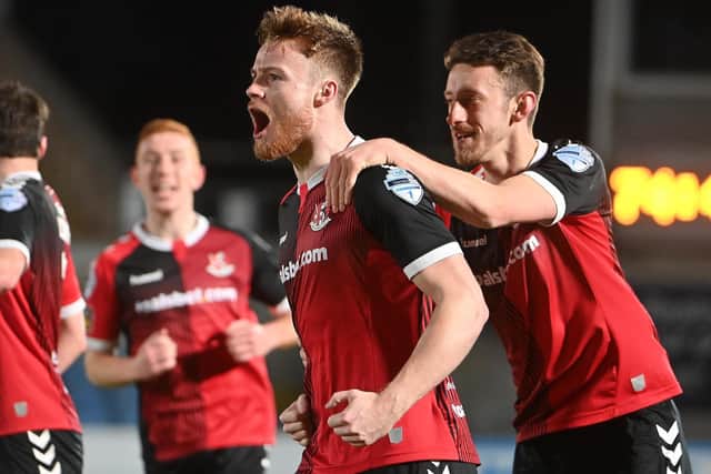 Aidan Wilson celebrates scoring the only goal of the game in victory for Crusaders over Ballymena United. Pic by PressEye Ltd.