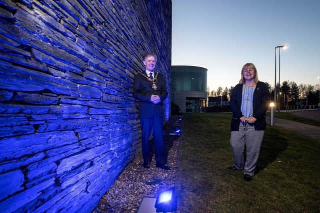 Mayor of Causeway Coast and Glens Borough Council Alderman Mark Fielding and Councillor Margaret Anne McKillop marked World Autism Awareness Day by shining blue lights on Cloonavin ) as part of an annual campaign to raise awareness about autistic spectrum disorders