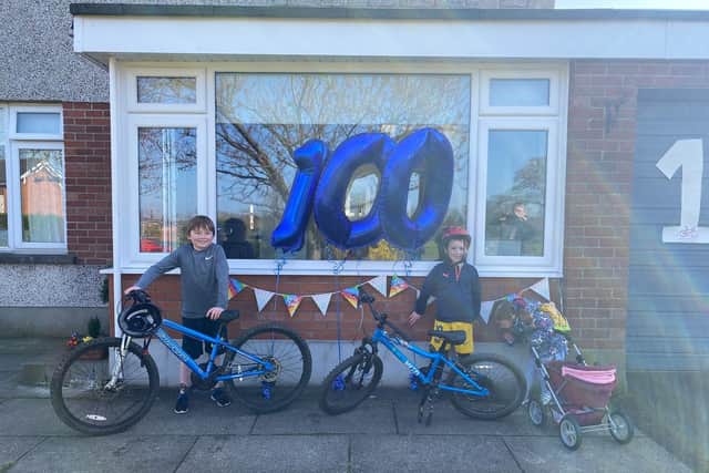 Sam, aged seven and Nathan, aged five-years old are raising money for Lisburn Foodbank after learning about it at school