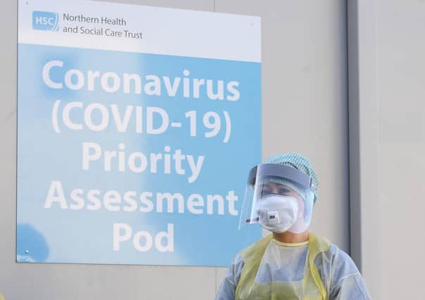 An Emergency Department Nurse during a demonstration of the Coronavirus pod and COVID-19 virus testing procedures set-up beside the Emergency Department of Antrim Area Hospital, Co Antrim in Northern Ireland. PA Photo. Picture date: Wednesday March 4, 2020. See PA story HEALTH Coronavirus Ulster. Photo credit should read: Michael Cooper/PA Wire