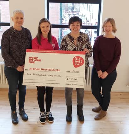NI Chest Heart and Stroke, Sinead Murray, accepting a cheque for £690 of funds raised through the Sharon Millar Exhibition held in December in the Sea Holly Art Gallery in Belfast.