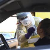 An Emergency Department Nurse during a demonstration of the Coronavirus pod and COVID-19 virus testing procedures set-up beside the Emergency Department in Northern Ireland (Michael Cooper/PA Wire)