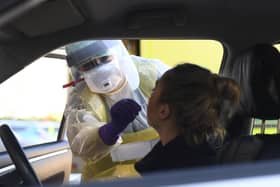 An Emergency Department Nurse during a demonstration of the Coronavirus pod and COVID-19 virus testing procedures set-up beside the Emergency Department in Northern Ireland (Michael Cooper/PA Wire)