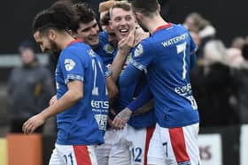 Kirk Millar celebrates finding the net against Carrick Rangers in Linfield's victory