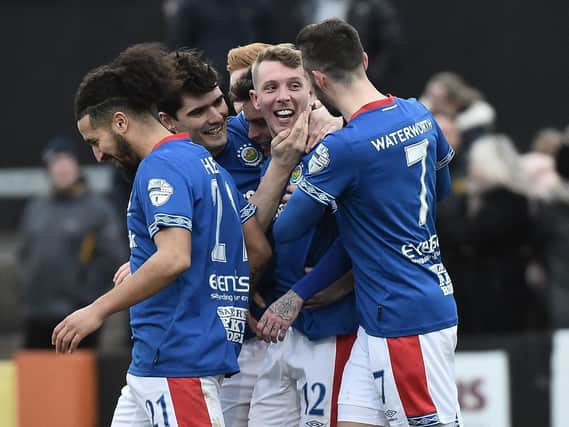 Kirk Millar celebrates finding the net against Carrick Rangers in Linfield's victory