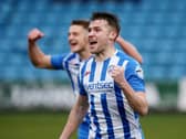 Stephen Lowry celebrates his goal
