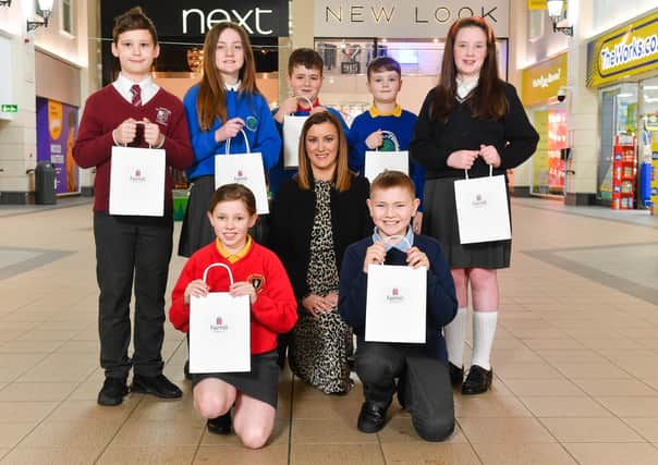 Primary School children from local primary schools were invited to Fairhill Shopping Centre, Ballymena to learn about careers in retail, centre management, operations and marketing. Pictured with Centre Manager, Natalie Jackson are, (back row) Louie Venner, St James’ Primary School, Ellie Forsthye, Broughshane Primary School, Rares Timuc, Ballymena Primary School, Ryan Graham, Camphill Primary School, Phoebe Tully, St. Colmcille’s Primary School, (front row) Bethany Herbinson, Ballykeel Primary School and Matthew Purkess, Fourtowns Primary School.