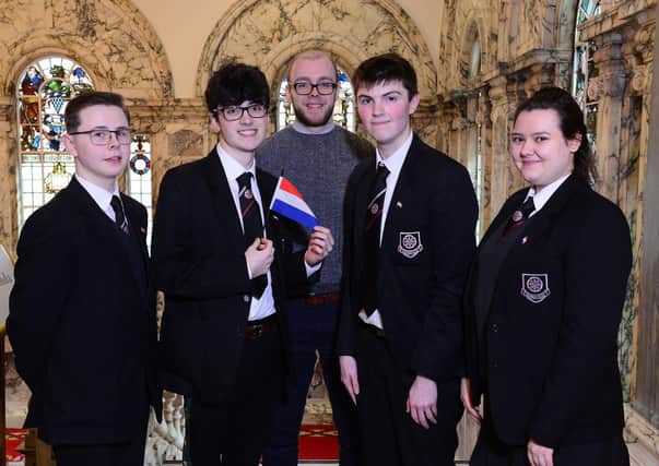 Cullybackey College pupils (from left) Rio Foster, Adam Wilson, David Atkinson and Jasmine McCrory are joined by teacher Mr McLaren at this year's Mock Council of the European Union debate at Belfast City Hall -  representing the Netherlands.