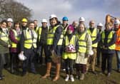 Mayor of Mid and East Antrim, Councillor Maureen Morrow, cuts the first sod at the site of the new Pavilion.