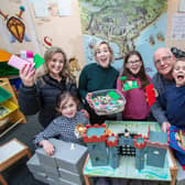 Councillors Cheryl Johnston and Billy Ashe pictured with Shirin Murphy (MEA) and children who are looking forward to the Brick Built event.