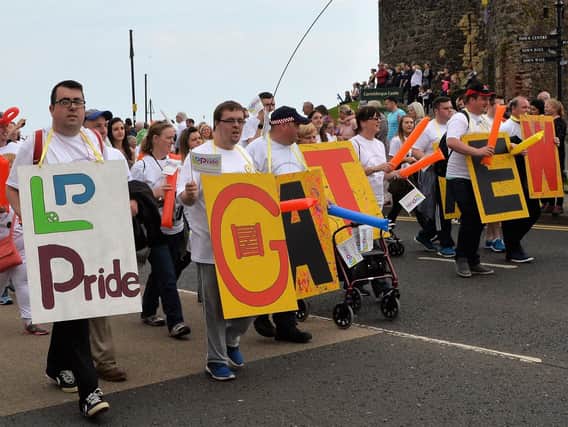 Members of Carrickfergus Senior Gateway Club taking part in the first ever Learning Disability Pride Parade in NI in 2017.  INCT 22-003-PSB
