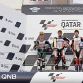 John McPhee on the Moto3 podium with Albert Arenas and Ai Ogura.