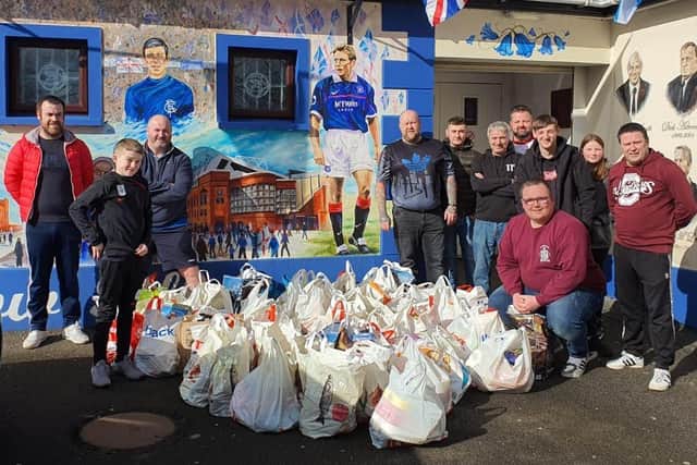 Members of Carrickfergus Defenders Flute Band distributed over 100 care packages to vulnerable people in the community.