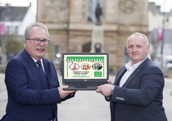 Jamie Hamill, Coleraine Bid Manager with Ian Donaghey MBE, Chair of Coleraine BID at the launch of Coleraine's Shopappy scheme. PICTURE STEVEN MCAULEY/MCAULEY MULTIMEDIA