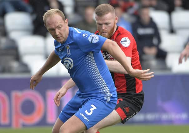 Dungannon Swifts' Ross Redman (left). Pic by INPHO.