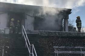 Firefighters finish putting out the latest fire at Sion CC's Clubhouse.