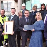 Pictured receiving the council's Silver Investors in People (IIP) Accreditation from Eddie Salmon, IIP assessor are: (front l-r) Mayor Councillor Alan Givan; Clifford Ferguson; David Burns, Chief Executive; Diana Stewart; Caroline Magee, Head of HR & OD; Alderman Paul Porter, Vice-Chair of the council's Corporate Services Committee and Amy Seawright.
(back l-r) Sean McConville; Emma Breadon and Paula Fay.