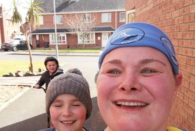 Christina Baker completed a half marathon in her driveway in Whitehead.