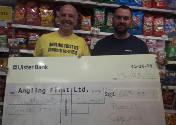 Jamie Pooole Dromore Supervalu presents Mark McGivern of Angling First
with a fundraising cheque of £663.33 which will fund this year's Fishing for Schools programme in the Dromore area.