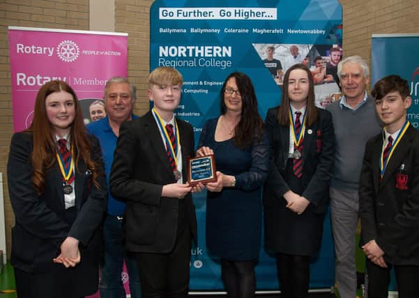 Runners-up Ballymena Academy team members Katie Gamble, Euan Johnston, Zara Jackson and Mani Traon pictured with Rotary Ballymena representative John Adams, Vice Prinicpal of Northern Regional College Jenny Small and competition judge Tom Keane from Sentinus