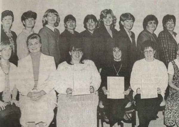 East Antrim Institute students who gained BTec National Certificates in Nursing Nursing and Childhood Studies at the Newtownabbey Campus - with their tutors.
1991