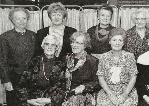 Members of the Adult Evening Craft Class at Downshire School where they models the garments they made. 1991