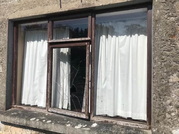 Windows were smashed in the church hall.