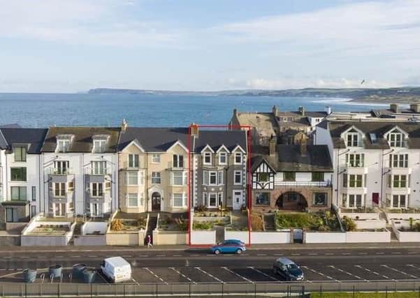 This nine bedroom mid-terrace property in Portrush (outlined here in red)  enjoys wonderful views across Ramore Head and the Atlantic Ocean.