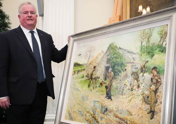 The UDR Benevolent Fund is calling on vulnerable former members throughout Northern Ireland, who need help and support and are facing financial hardship, to get in touch with the charity. Pictured is Brian Kennedy, Secretary of the UDR Benevolent Fund, with the recently restored painting, ‘The Search’ by renowned artist Terence Cuneo.
(pic: Press Eye Ltd.)