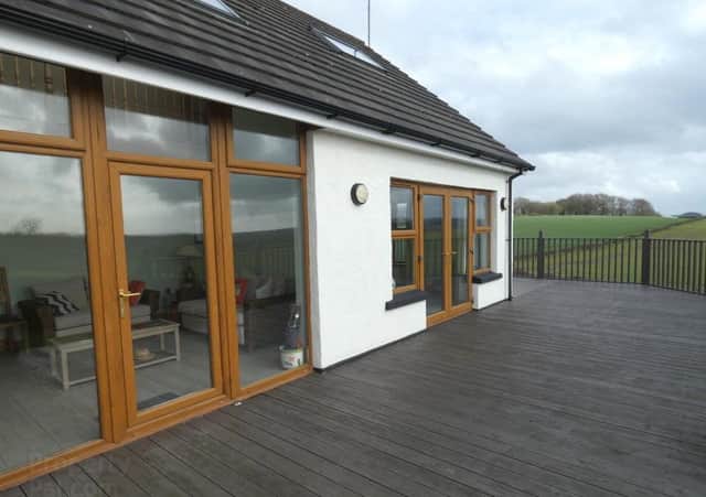 A view of the raised southerly facing external decked area