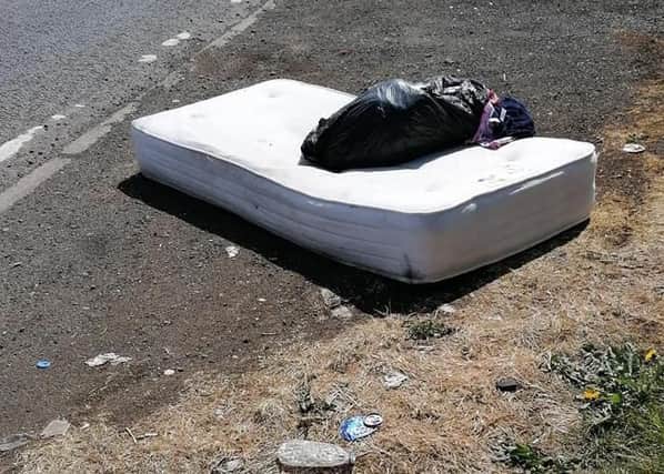 A mattress was one of the items dumped on the Upper Hightown Road. Pic by Heather Wilson.