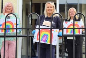 Linda Watson (right), distributing essential supplies to tenants  during Covid-19. The Housing Executive has announced a Covid-19 Response Fund, totaling £260,000 to support positive community activity during the pandemic emergency in neighbourhoods across Northern Ireland.