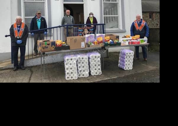 Moyasset Heritage and Cultural Society have distribute gift parcels to the elderly and housebound with the help of lodge members of Moyasset LOL 531.  Pictured: Robert Greer, Joe and Moira Steed, Fiona McCord and Joe Kernohan