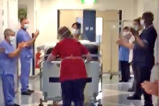 Nurses clap for Geoffrey McKillop as he is moved out of ICU. Pic McAuley Multmedia