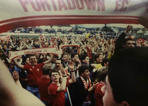 Fans celebrate at Shamrock Park following the final whistle in 1990. Pic courtesy of Portadown FC.