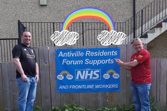 Man United fans Alan Withers and Scott Geoghegan donned Liverpool shirts while delivering hot meals in the Antiville area.