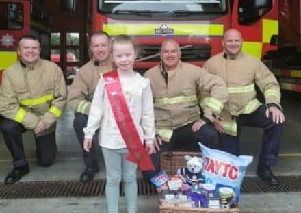 Emma delivered the hamper to Glengormley Fire Station on May 12.